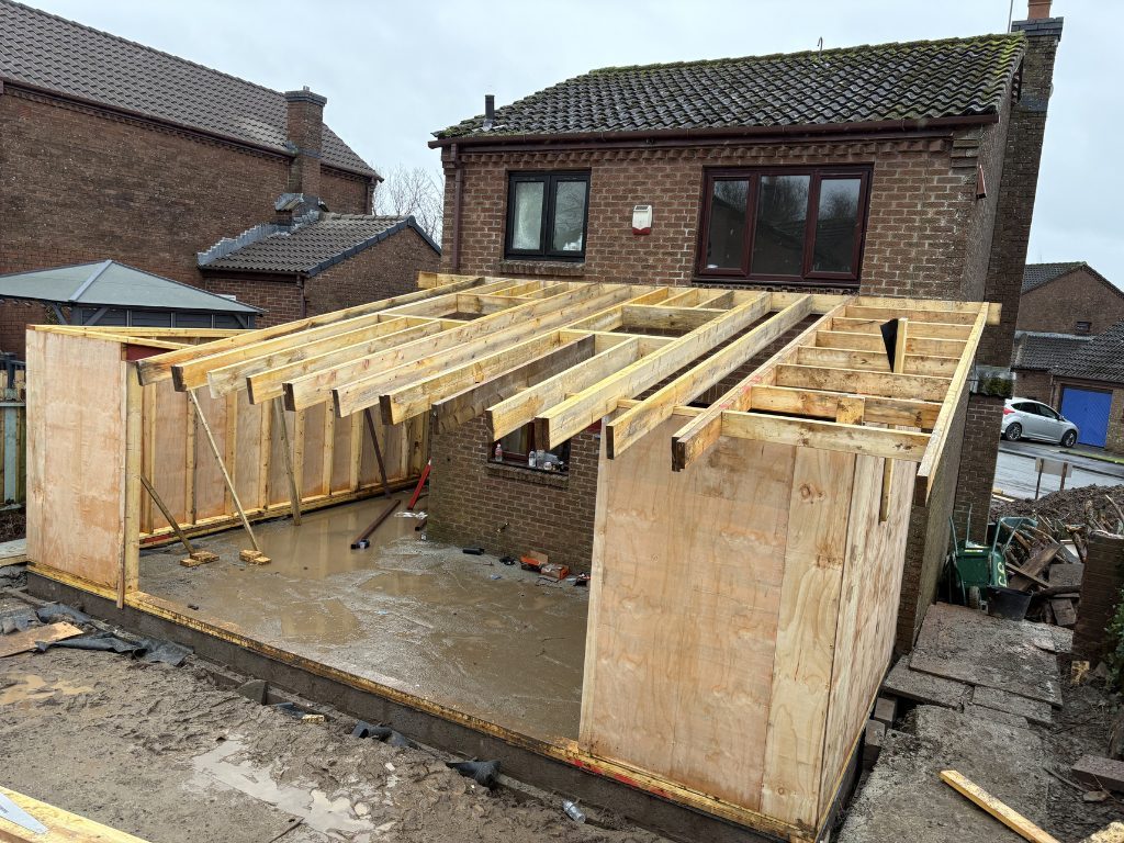 Roof — new joists set out over the space — extensions by Jenga Joiners in East Kilbride