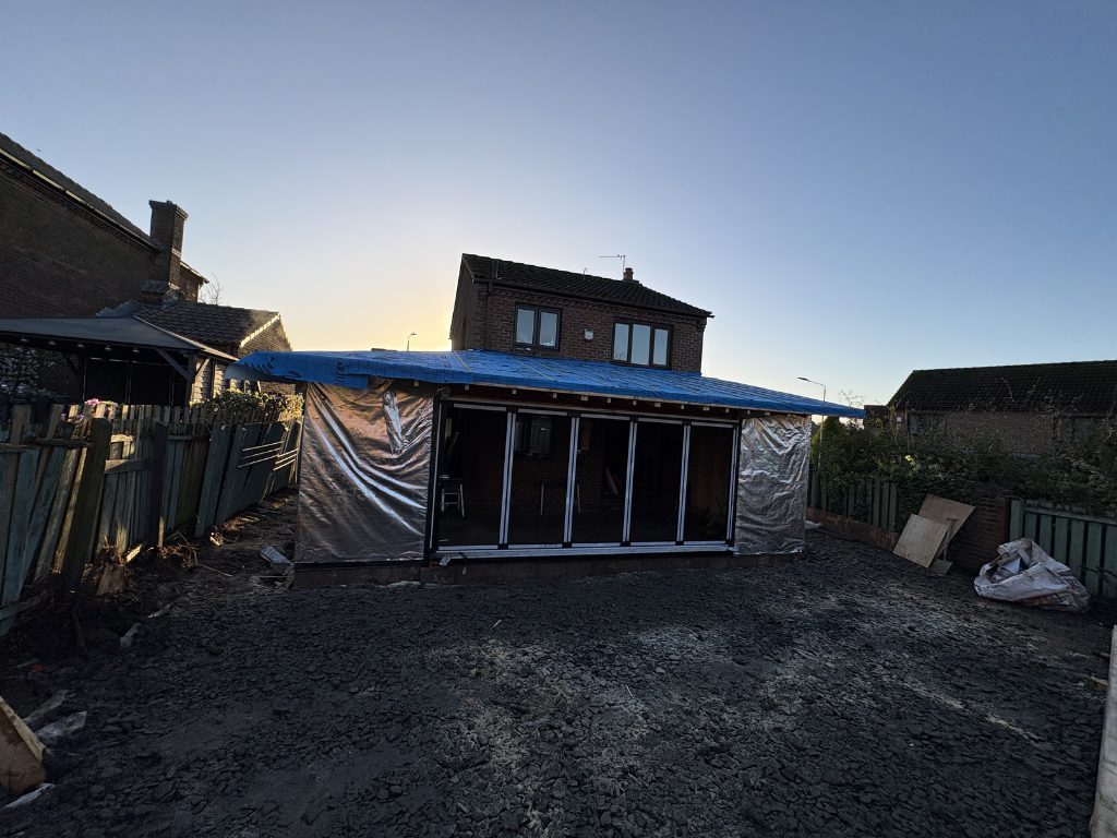 Weathertight — wrapped and covered against the weather — extensions by Jenga Joiners in East Kilbride
