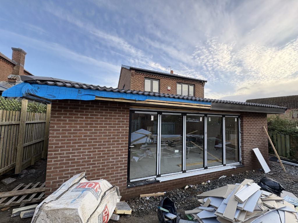 Exterior — brickwork and roof complete — extensions by Jenga Joiners in East Kilbride